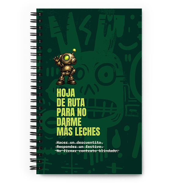 Libreta de espiral verde de Autónomos Salvajes con el título Hoja de ruta para no darme más leches, un detalle para autónomos ideal para organizar el negocio.